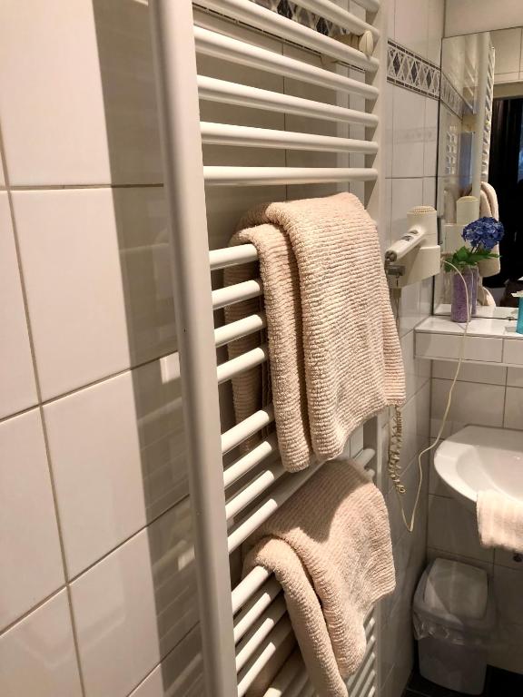 Koupelna v ubytování Hotel am Bahnhof