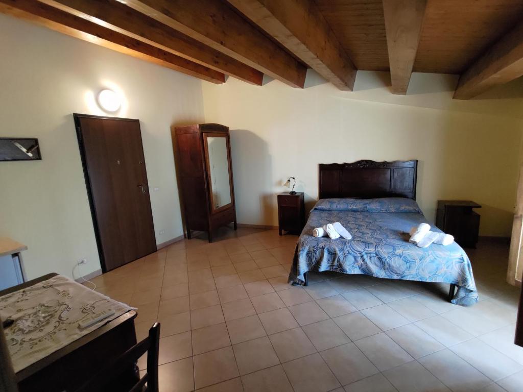 Postel nebo postele na pokoji v ubytování Albergo Diffuso IL MIGLIO