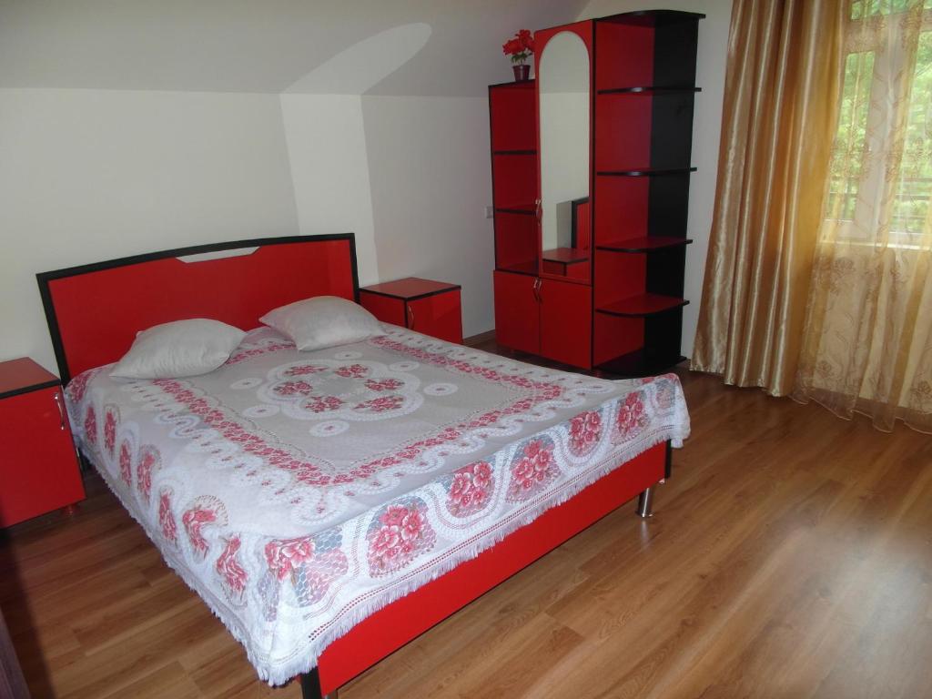 Postel nebo postele na pokoji v ubytování Sanni Guest House