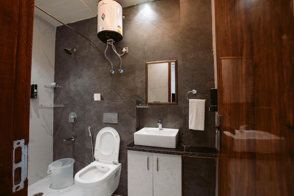 Koupelna v ubytování FlxHo Duo - Serviced Apartment & Rooms - Golf Course Road