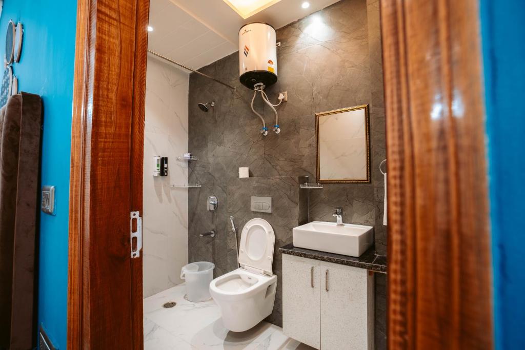 Koupelna v ubytování FlxHo Duo - Serviced Apartment & Rooms - Golf Course Road