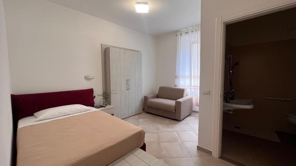 Postel nebo postele na pokoji v ubytování B&B Aurora