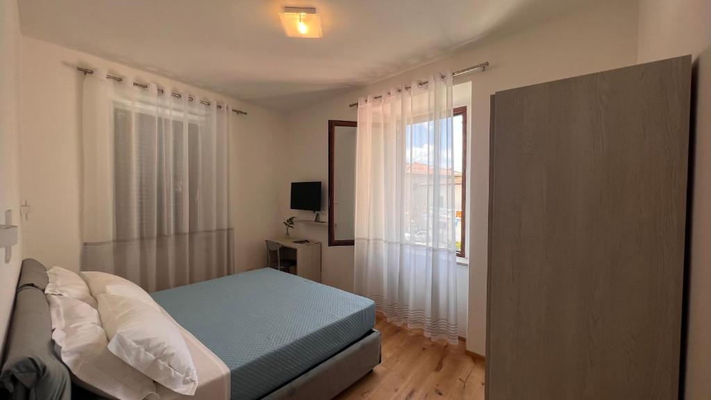 Postel nebo postele na pokoji v ubytování B&B Aurora