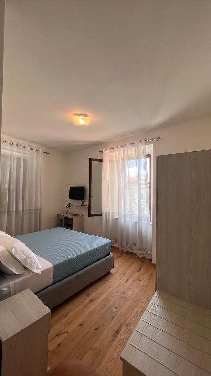 Postel nebo postele na pokoji v ubytování B&B Aurora
