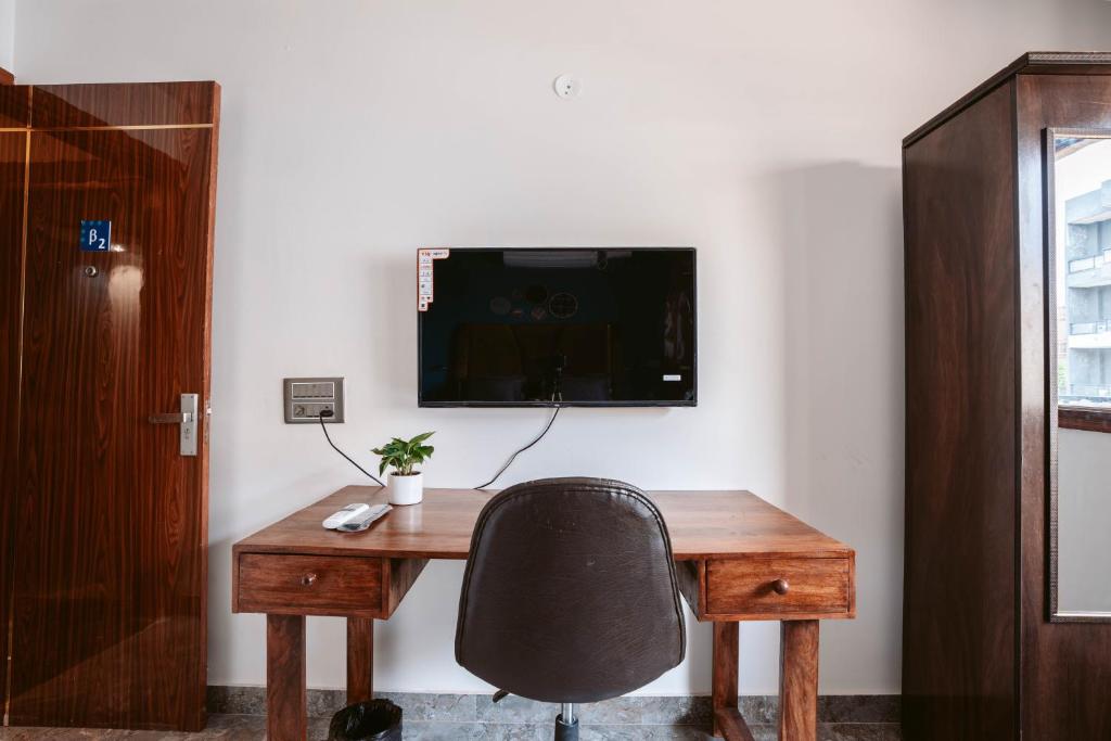 TV a/nebo společenská místnost v ubytování FlxHo Duo - Serviced Apartment & Rooms - Golf Course Road