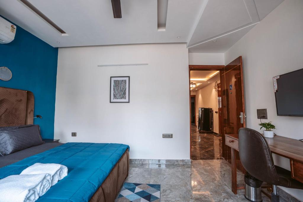TV a/nebo společenská místnost v ubytování FlxHo Duo - Serviced Apartment & Rooms - Golf Course Road