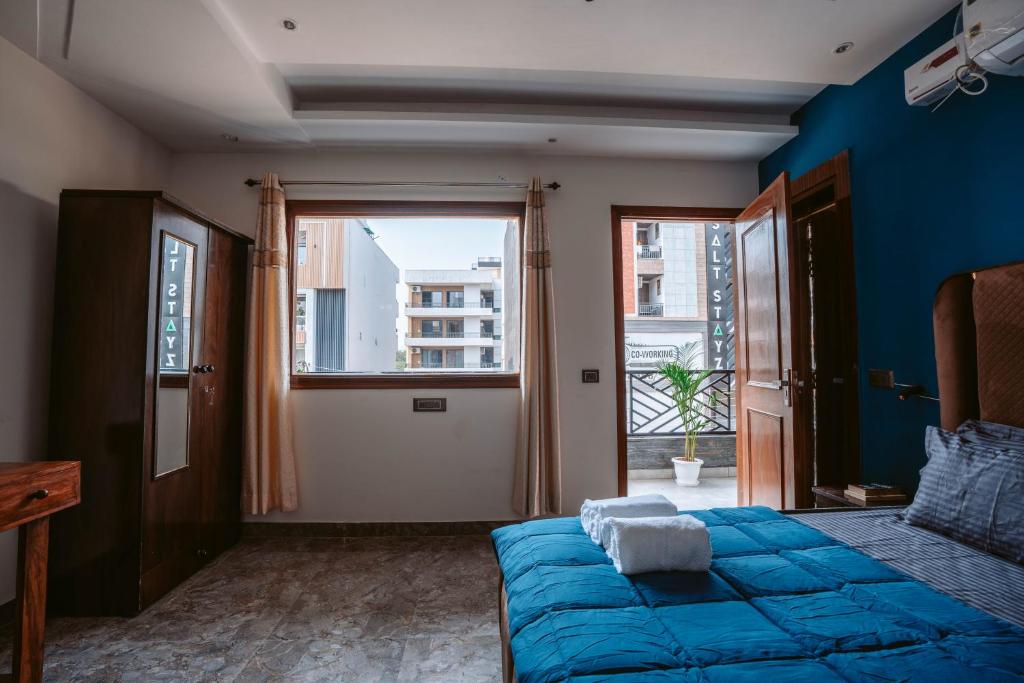 Posezení v ubytování FlxHo Duo - Serviced Apartment & Rooms - Golf Course Road