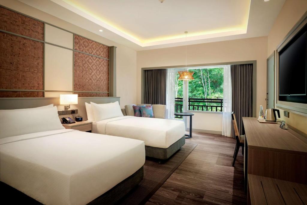 Postelja oz. postelje v sobi nastanitve DoubleTree by Hilton Damai Laut