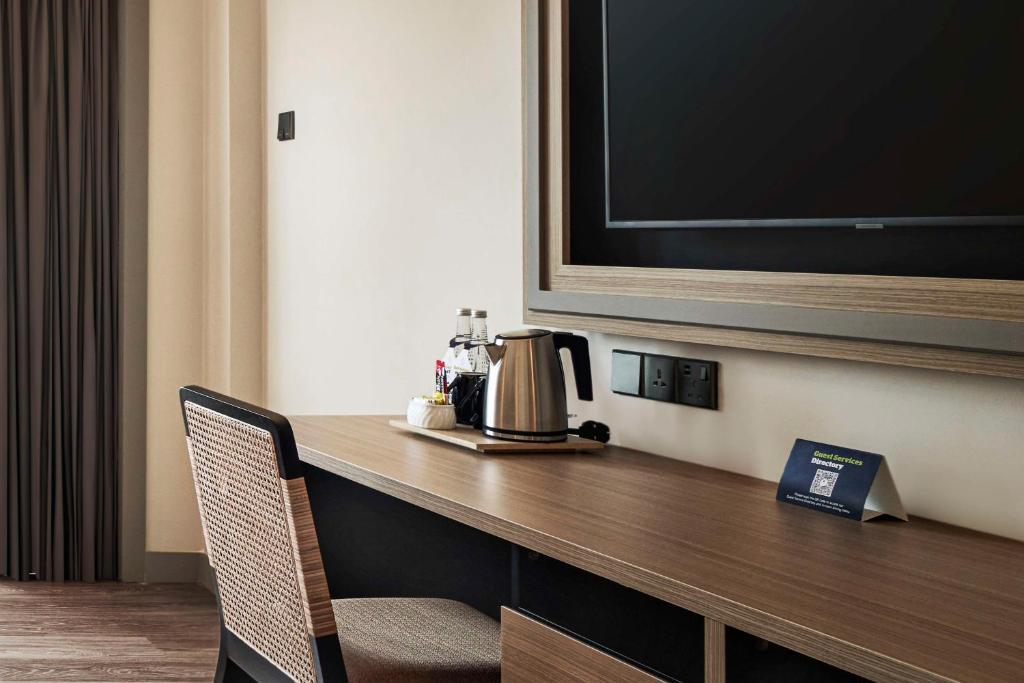 TV in/ali zabaviščno središče v nastanitvi DoubleTree by Hilton Damai Laut