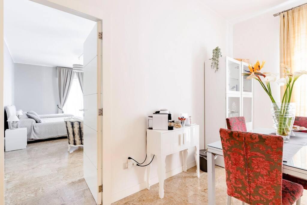 Postel nebo postele na pokoji v ubytování BB SUITE Siracusa