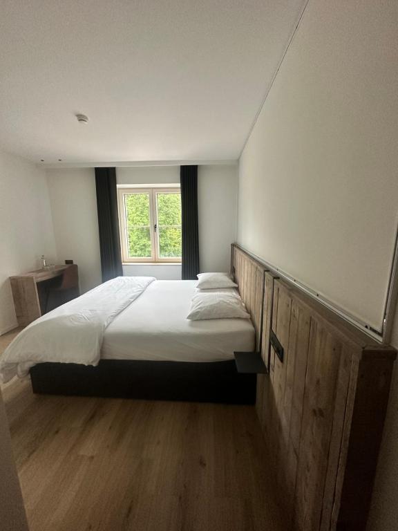 Postel nebo postele na pokoji v ubytování Café Coureur Houffalize