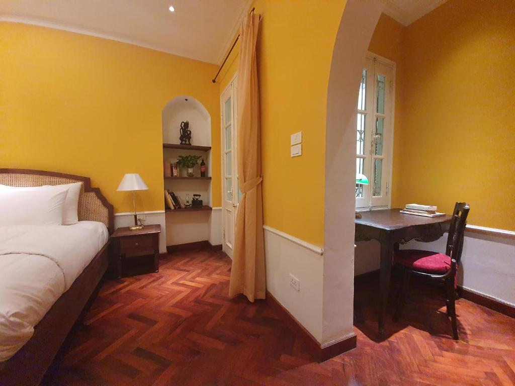 Postel nebo postele na pokoji v ubytování Tonkin House