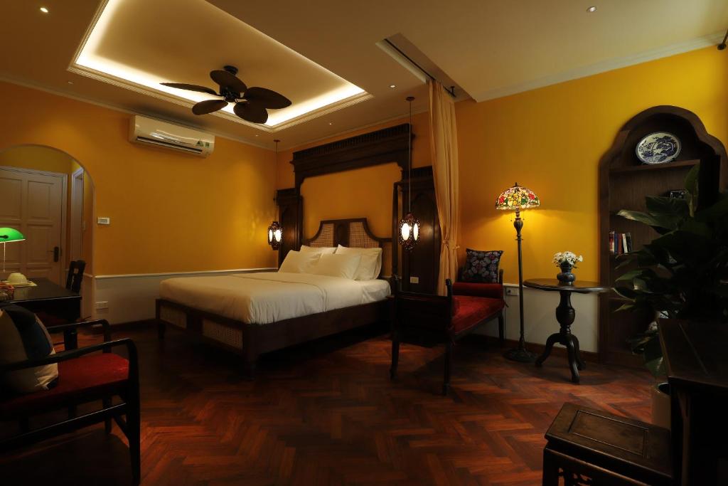 Postel nebo postele na pokoji v ubytování Tonkin House