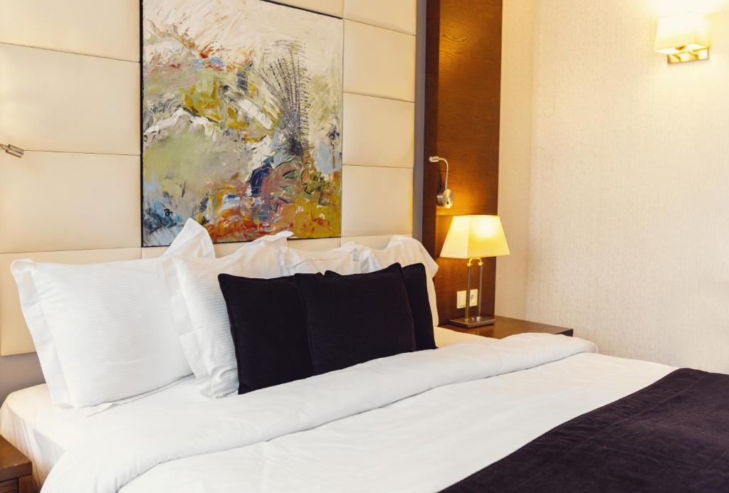 Postel nebo postele na pokoji v ubytování Costé Hotel