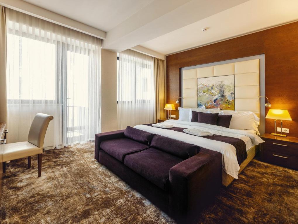 Postel nebo postele na pokoji v ubytování Costé Hotel