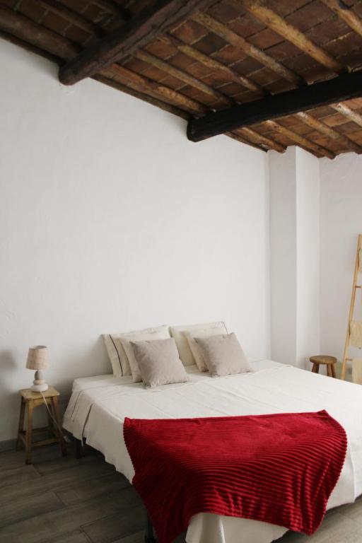 Cama ou camas em um quarto em Casa da Moeda
