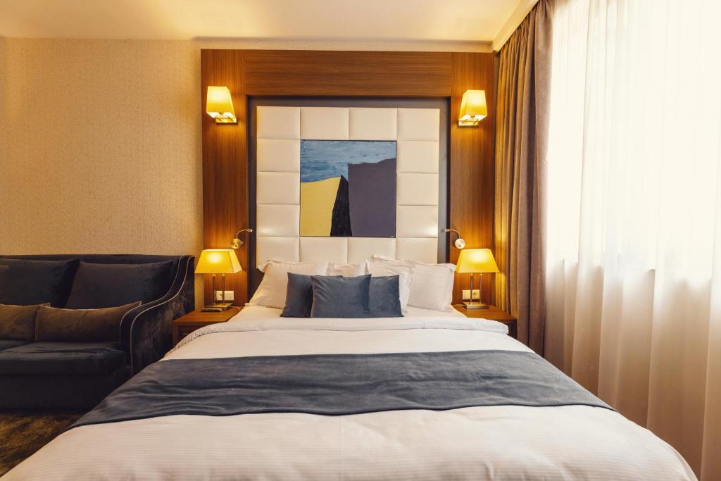 Postel nebo postele na pokoji v ubytování Costé Hotel