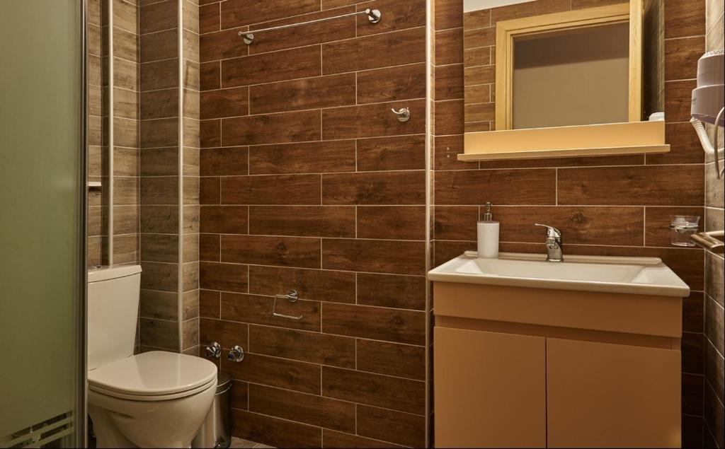 Kúpeľňa v ubytovaní Athos Thea Luxury Rooms