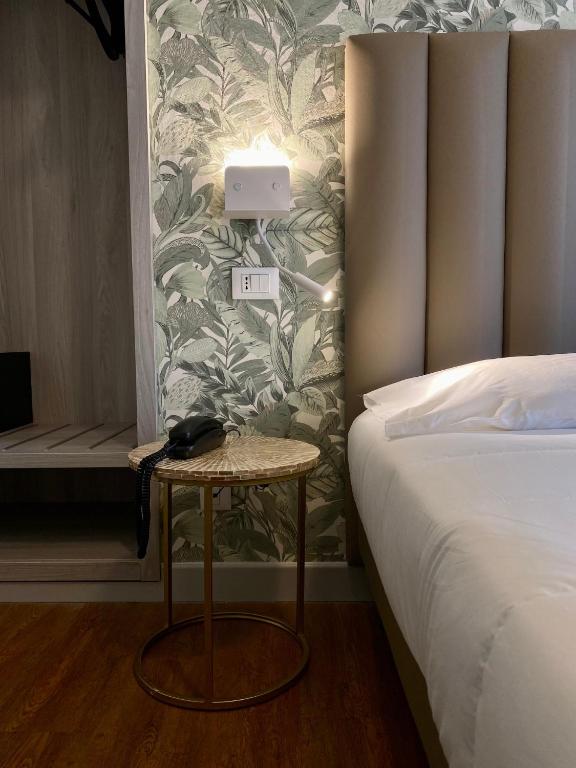 Postel nebo postele na pokoji v ubytování Hotel Liu