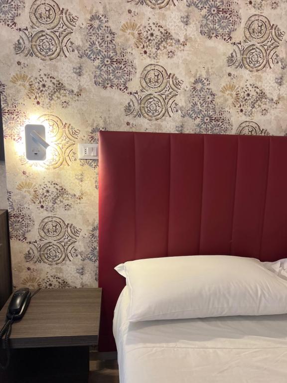 Postel nebo postele na pokoji v ubytování Hotel Liu
