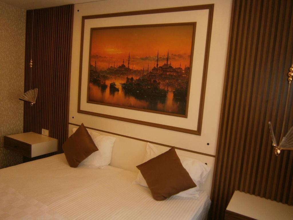 A bed or beds in a room at Nos Istanbul