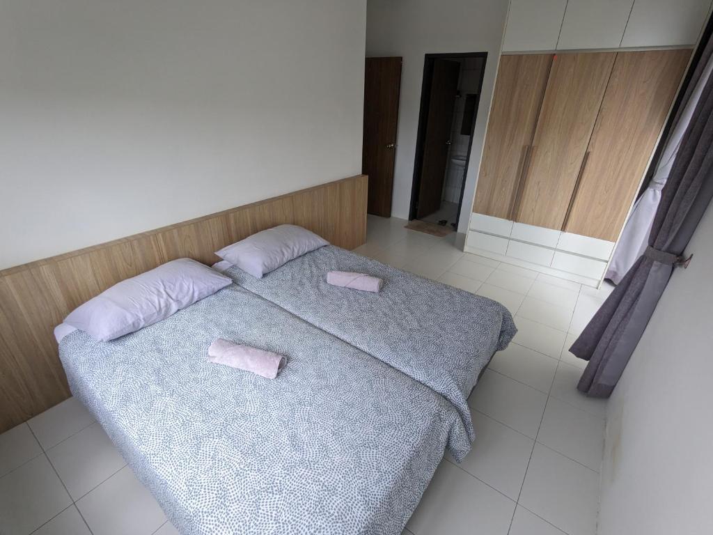 Postel nebo postele na pokoji v ubytování Alor Setar Imperio by IM Staycation 3bedroom & Rooftop Pool