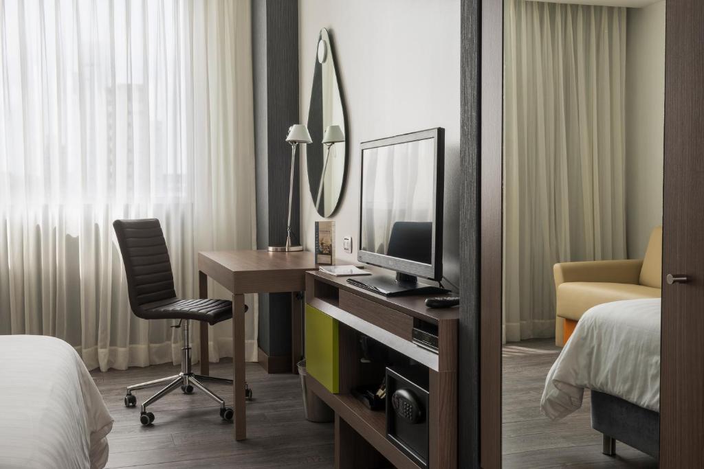Postel nebo postele na pokoji v ubytování Hampton by Hilton Barranquilla
