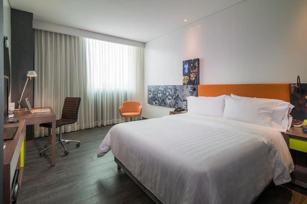 Postel nebo postele na pokoji v ubytování Hampton by Hilton Barranquilla