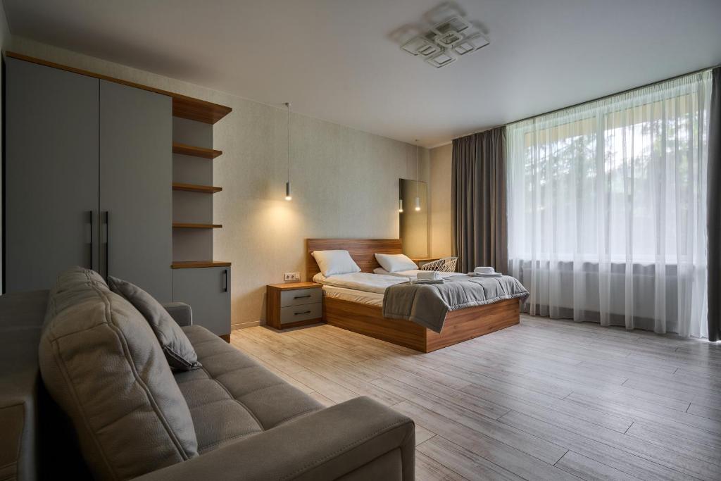 Postel nebo postele na pokoji v ubytování Готель У Борисовича & SPA
