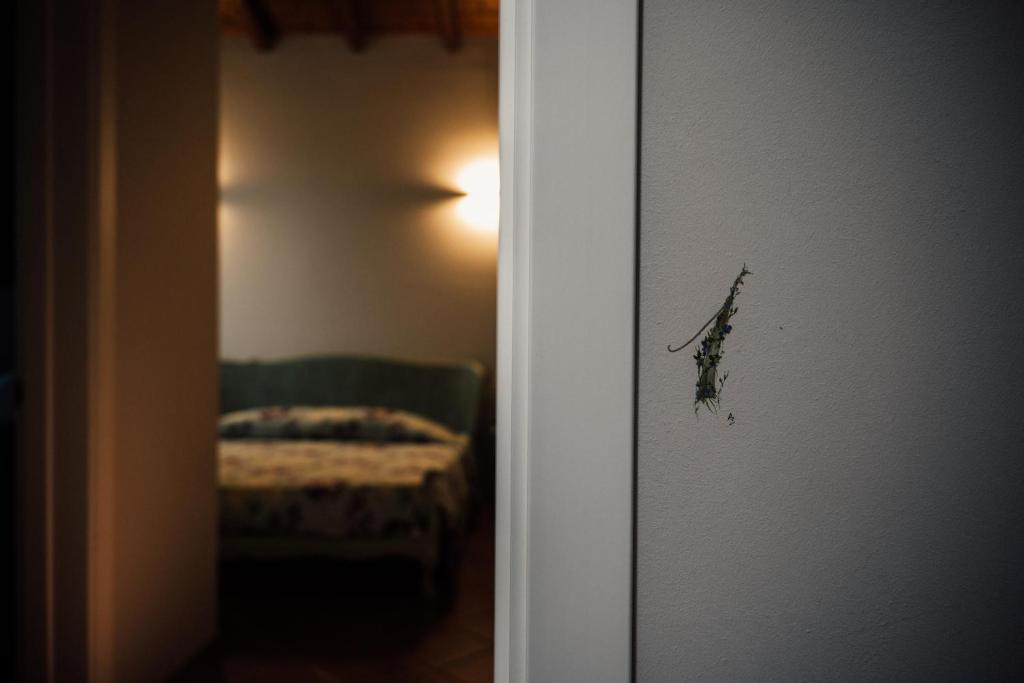Posteľ alebo postele v izbe v ubytovaní Albergo La Meridiana