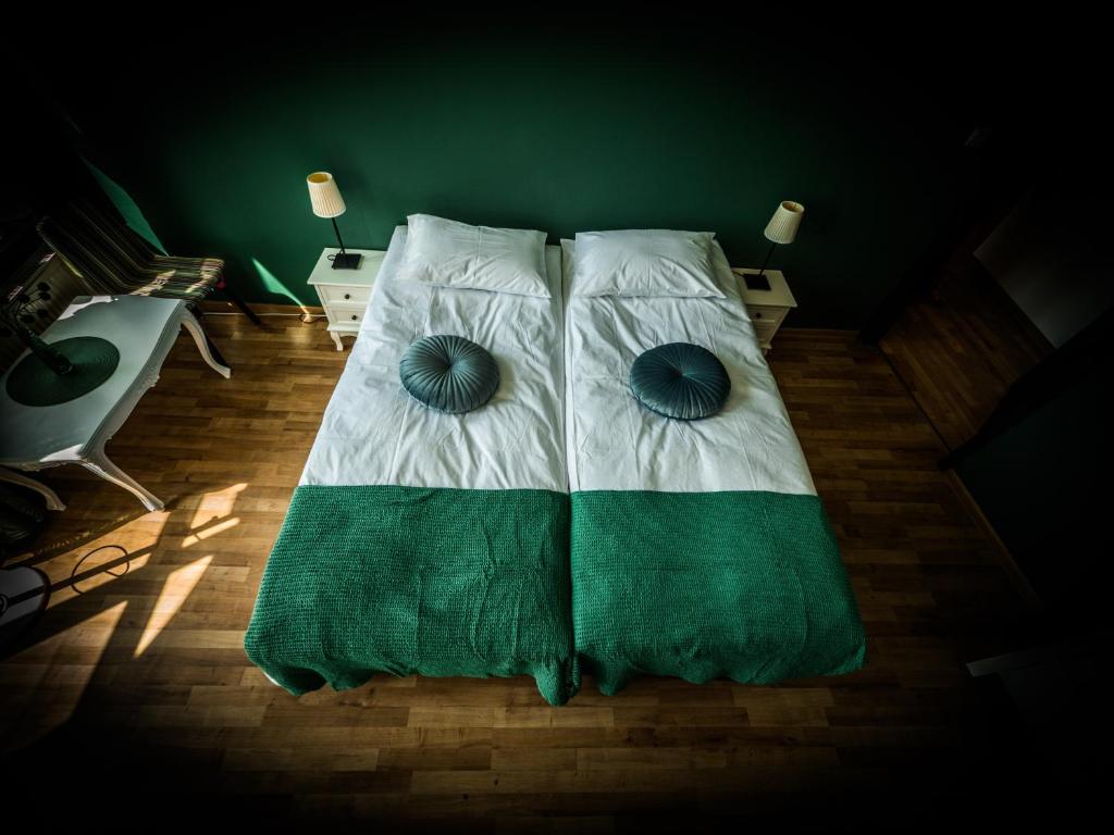 Postel nebo postele na pokoji v ubytování Hostel Pod Basztą