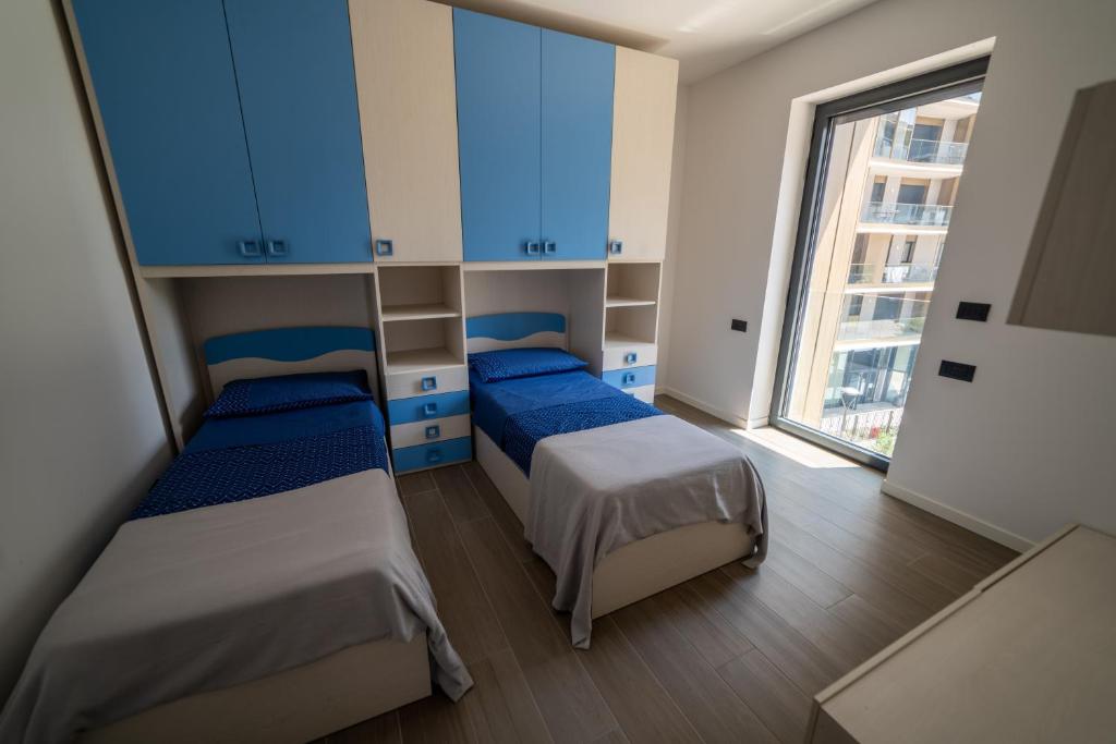 Postel nebo postele na pokoji v ubytování @UptownLiving