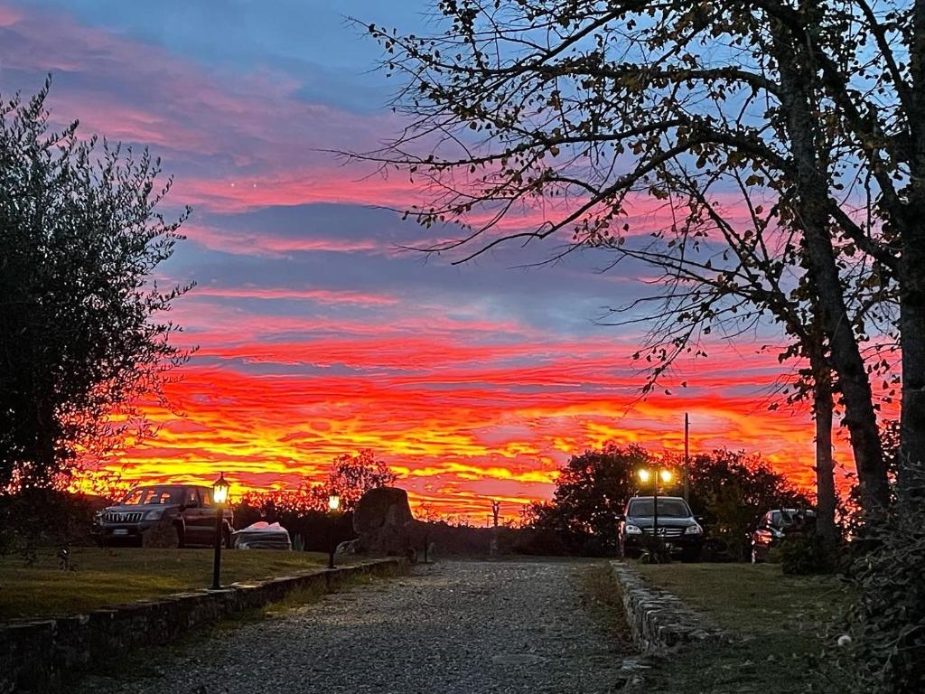 The sunrise or sunset as seen from az apartmanhoteleket or nearby