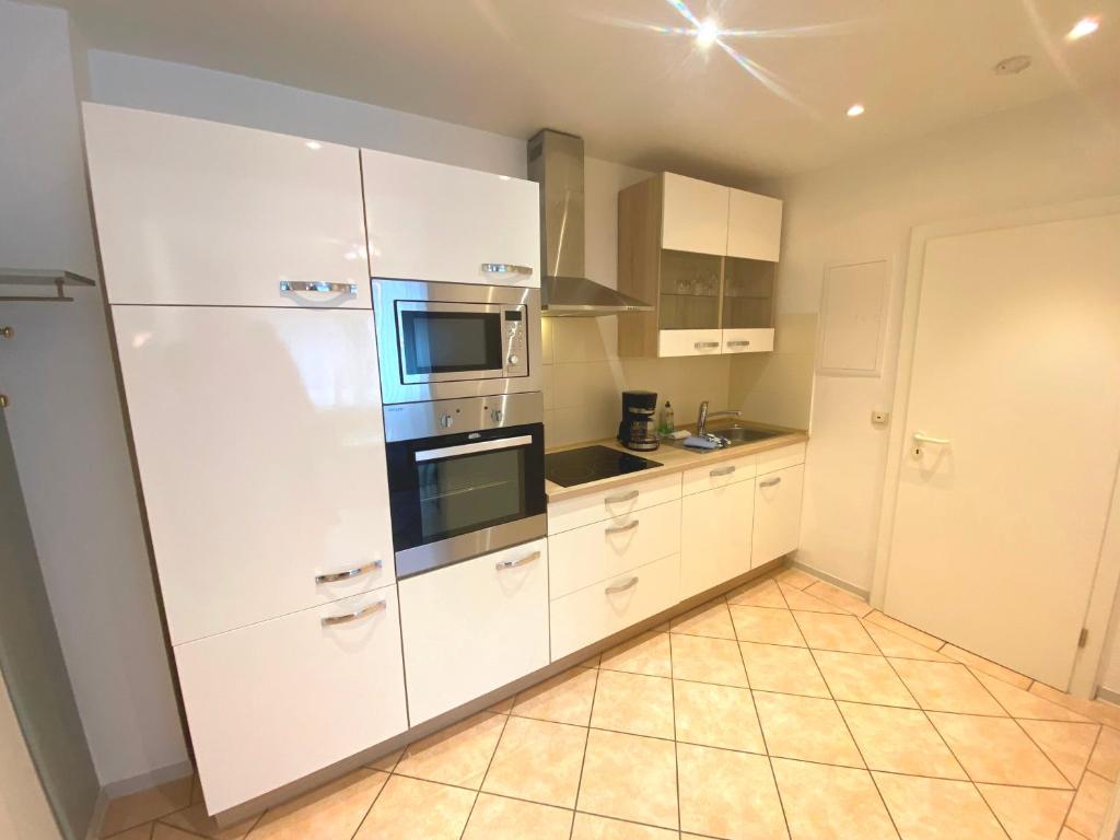 Kuchyň nebo kuchyňský kout v ubytování Haus Regina