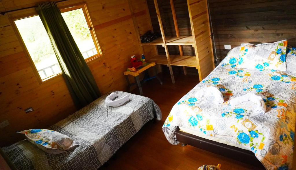 Postel nebo postele na pokoji v ubytování Finca Severo Refugio