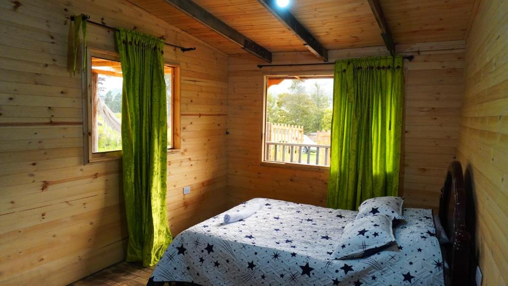 Postel nebo postele na pokoji v ubytování Finca Severo Refugio