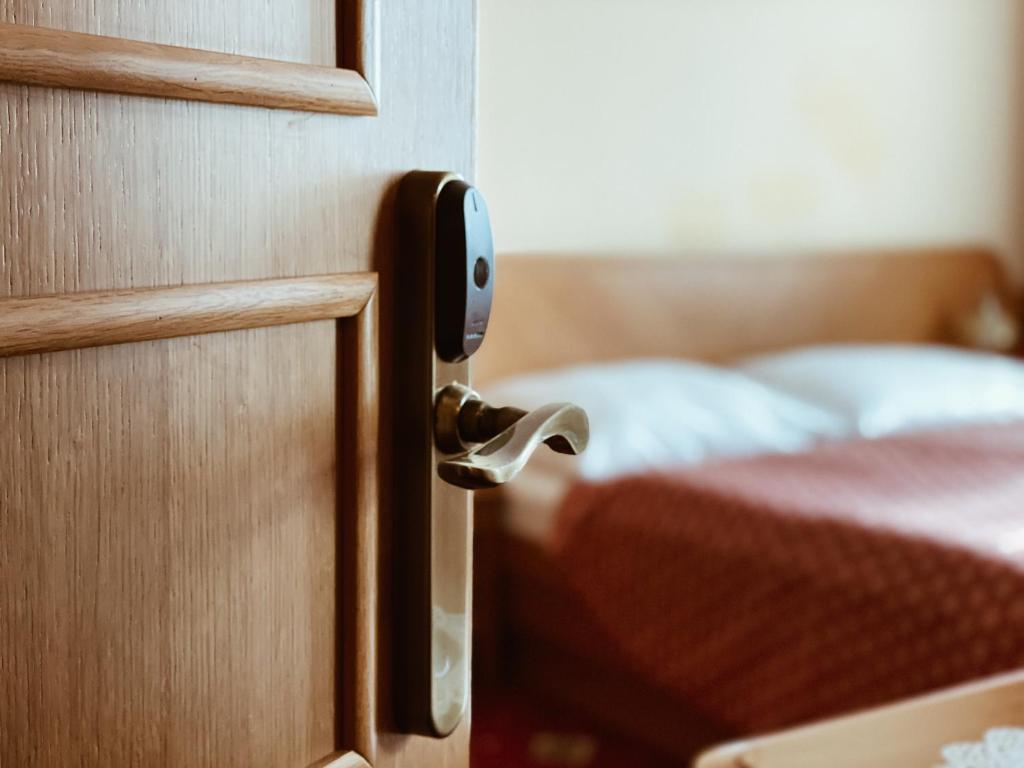 Postel nebo postele na pokoji v ubytování Hotel Askania