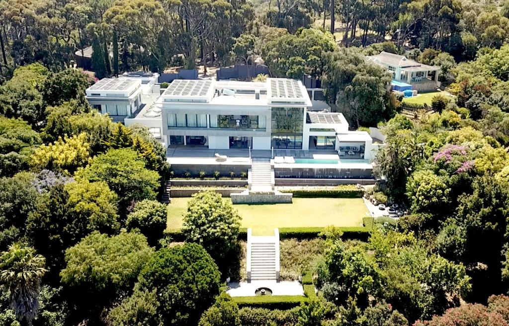 an aerial view of a large white house at Camelot Villa in Cape Town