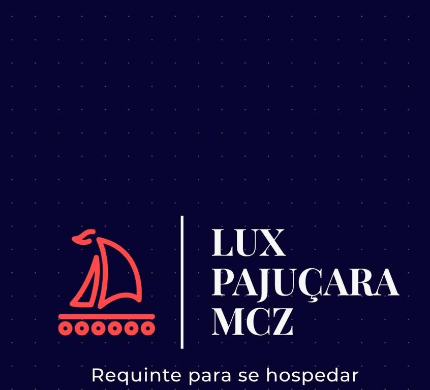 a sign for the luix palapa mccaza with a sailboat at LUX PAJUÇARA MCZ in Maceió