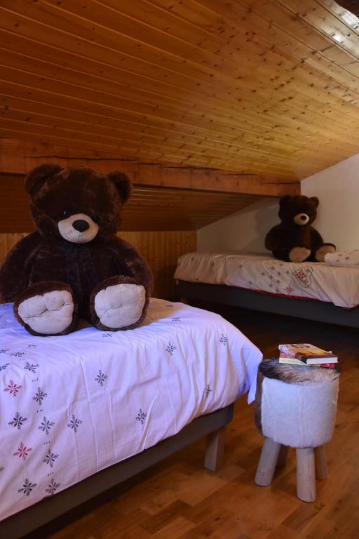Postel nebo postele na pokoji v ubytování Chalet la Dransette