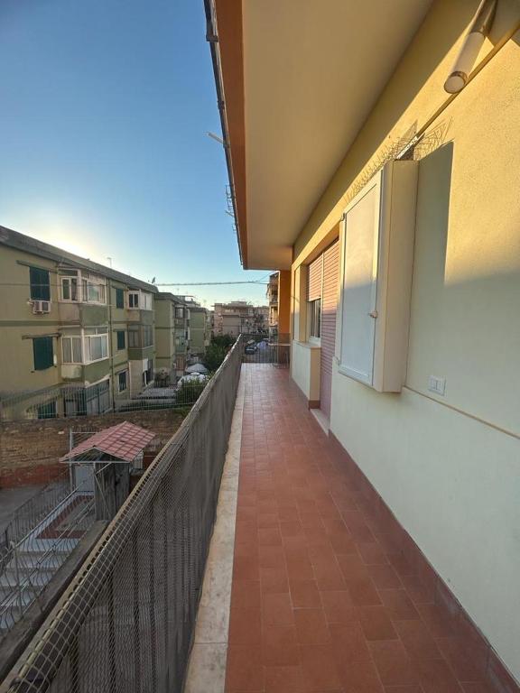 a balcony of a building with a refrigerator on it at CASA VACANZA BELVEDERE in Ercolano