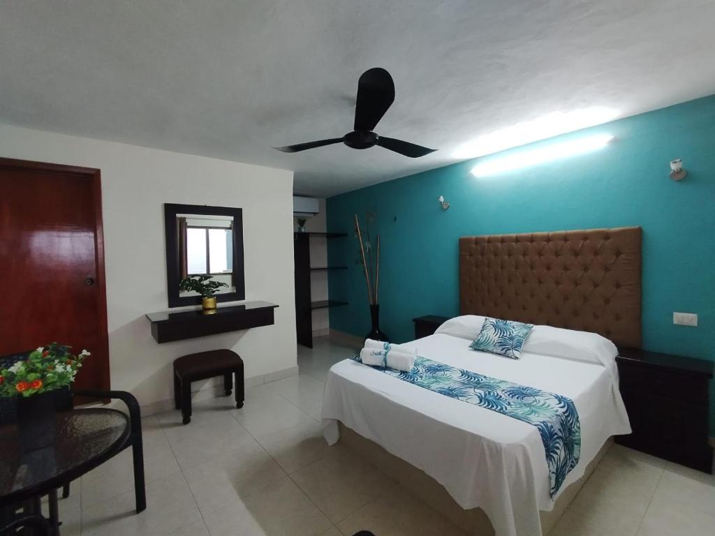 Postel nebo postele na pokoji v ubytování Hotel San Miguel