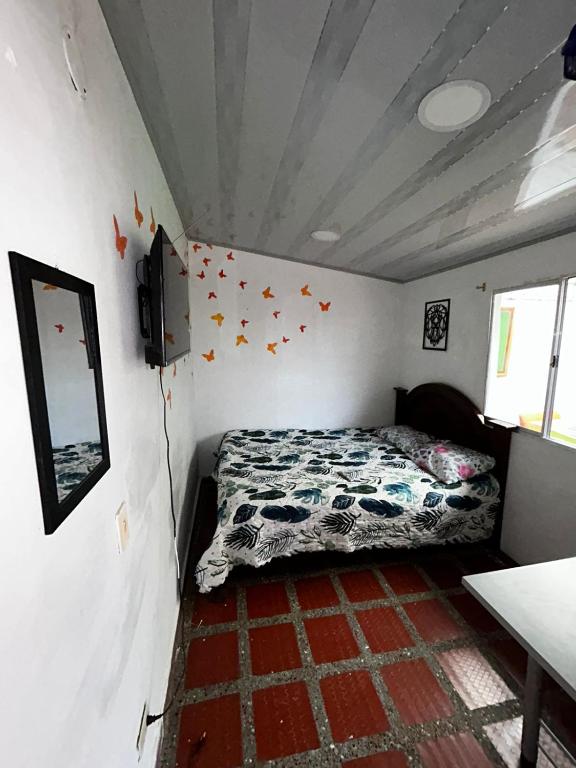 Postel nebo postele na pokoji v ubytování Hostel Urban City Medellin