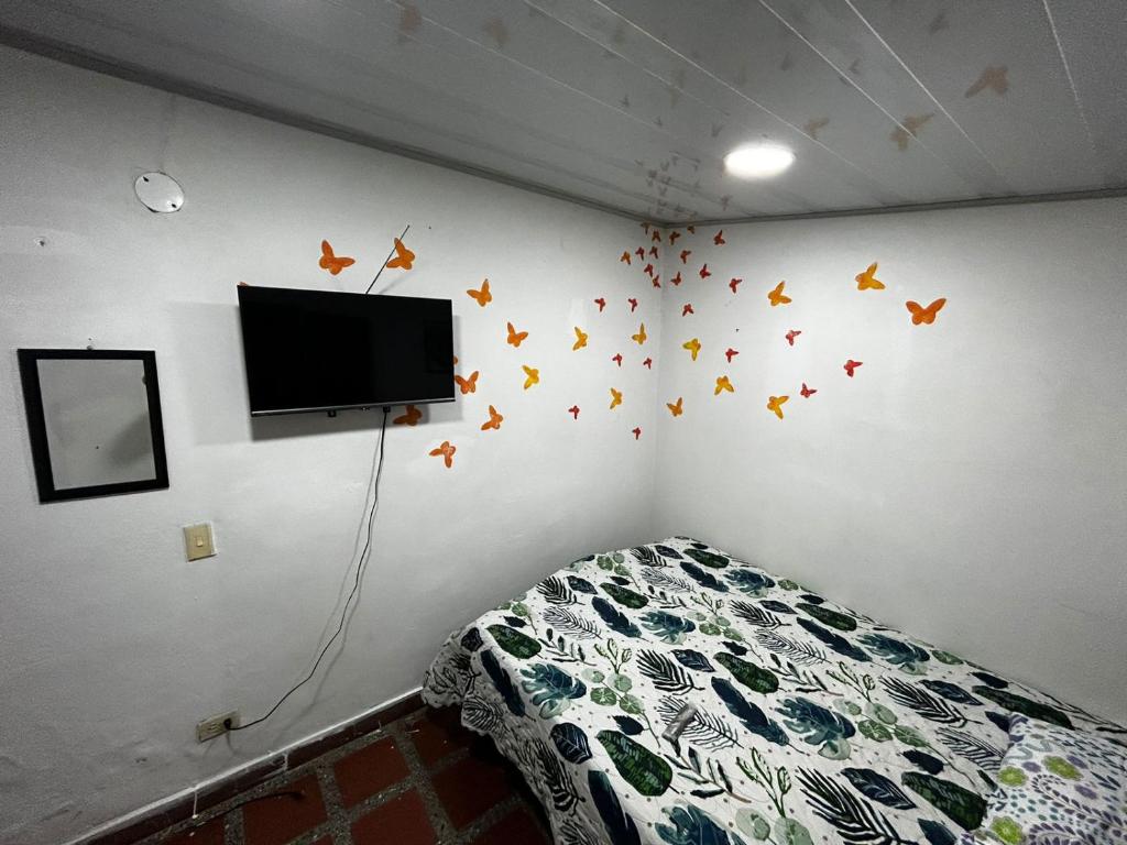 Postel nebo postele na pokoji v ubytování Hostel Urban City Medellin