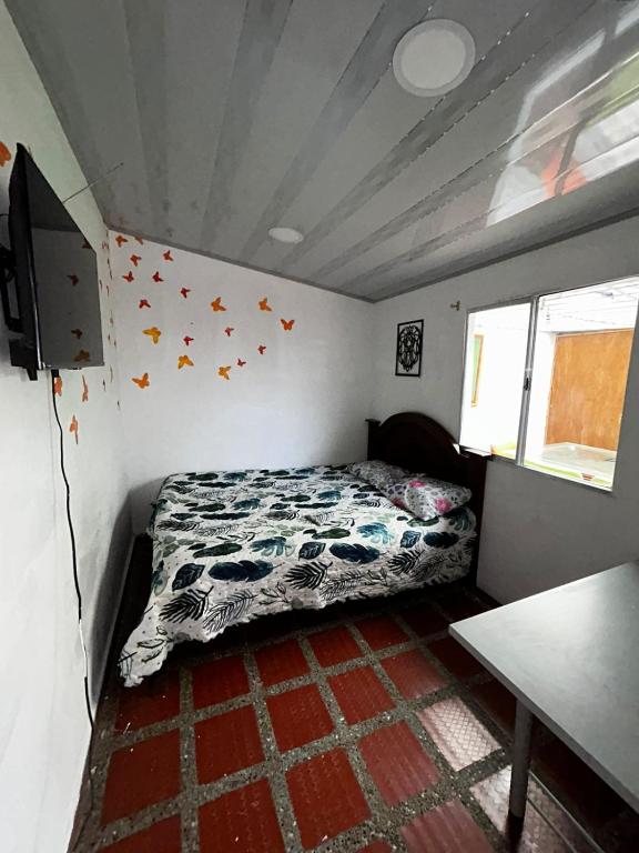 Postel nebo postele na pokoji v ubytování Hostel Urban City Medellin