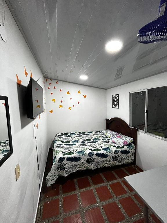 Postel nebo postele na pokoji v ubytování Hostel Urban City Medellin