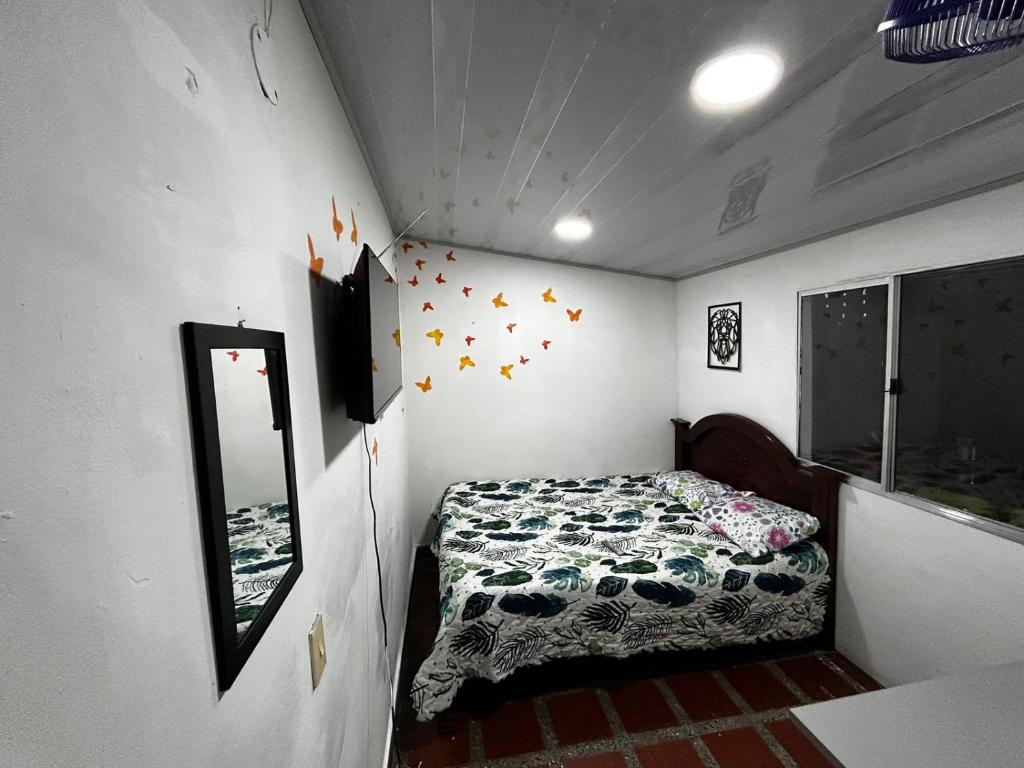Postel nebo postele na pokoji v ubytování Hostel Urban City Medellin