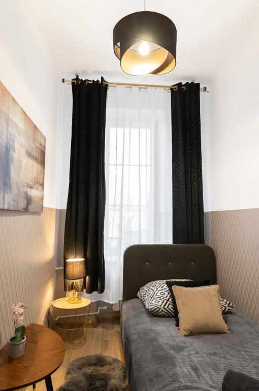Posedenie v ubytovaní ClickTheFlat Aleje Niepodległości Center Apart Rooms