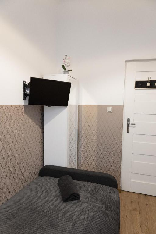 Posteľ alebo postele v izbe v ubytovaní ClickTheFlat Aleje Niepodległości Center Apart Rooms
