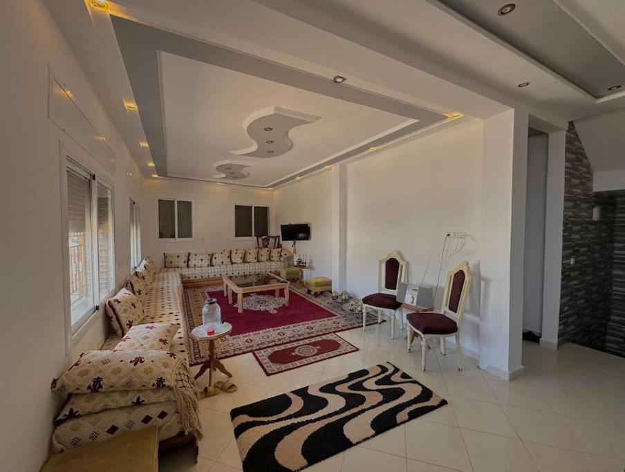 Posezení v ubytování Villa avec vue sur mer